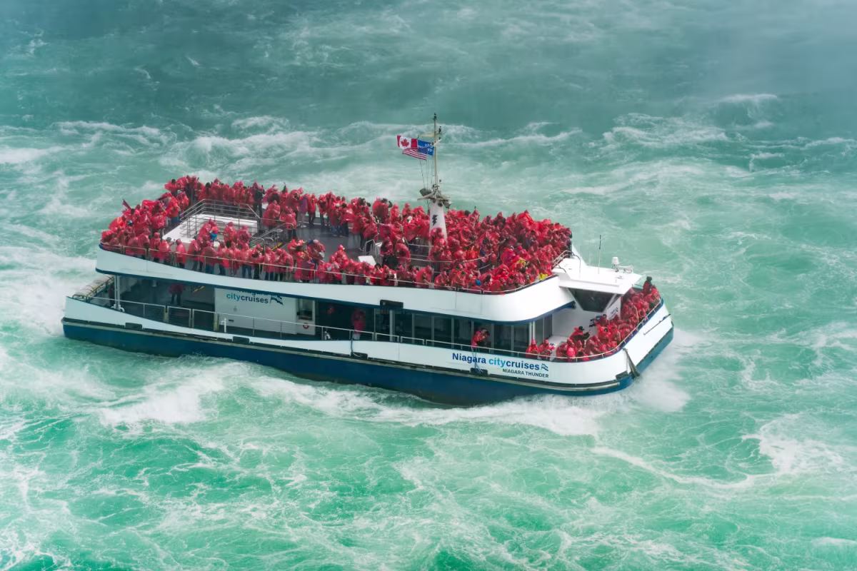 Niagara Falls Night Tour with Journey, Skylon, and Boat Cruise